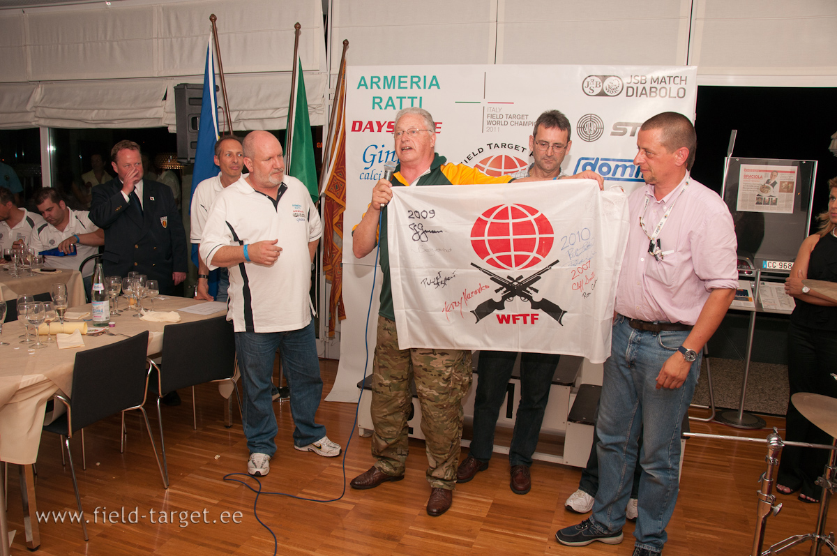 and Alessandro gives flag to Andrew